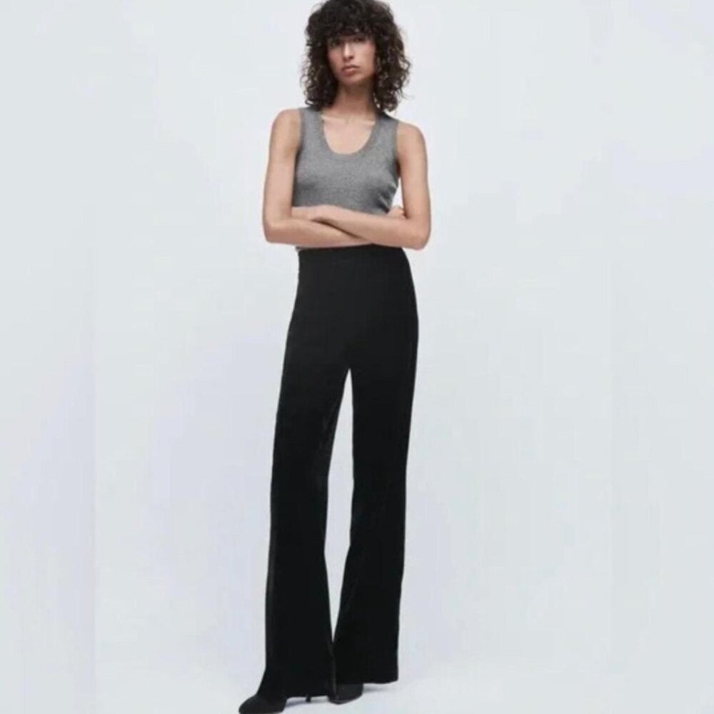 Black Velvet HIGH WAISTED PANTS WITH SIDE HIDDEN IN- SEAM ZIPPER. FLARED LEGS